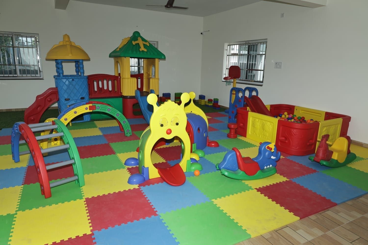 Spacious, colourful indoor play area at SPN AlphabetZ with slides, tunnels and a ball pit