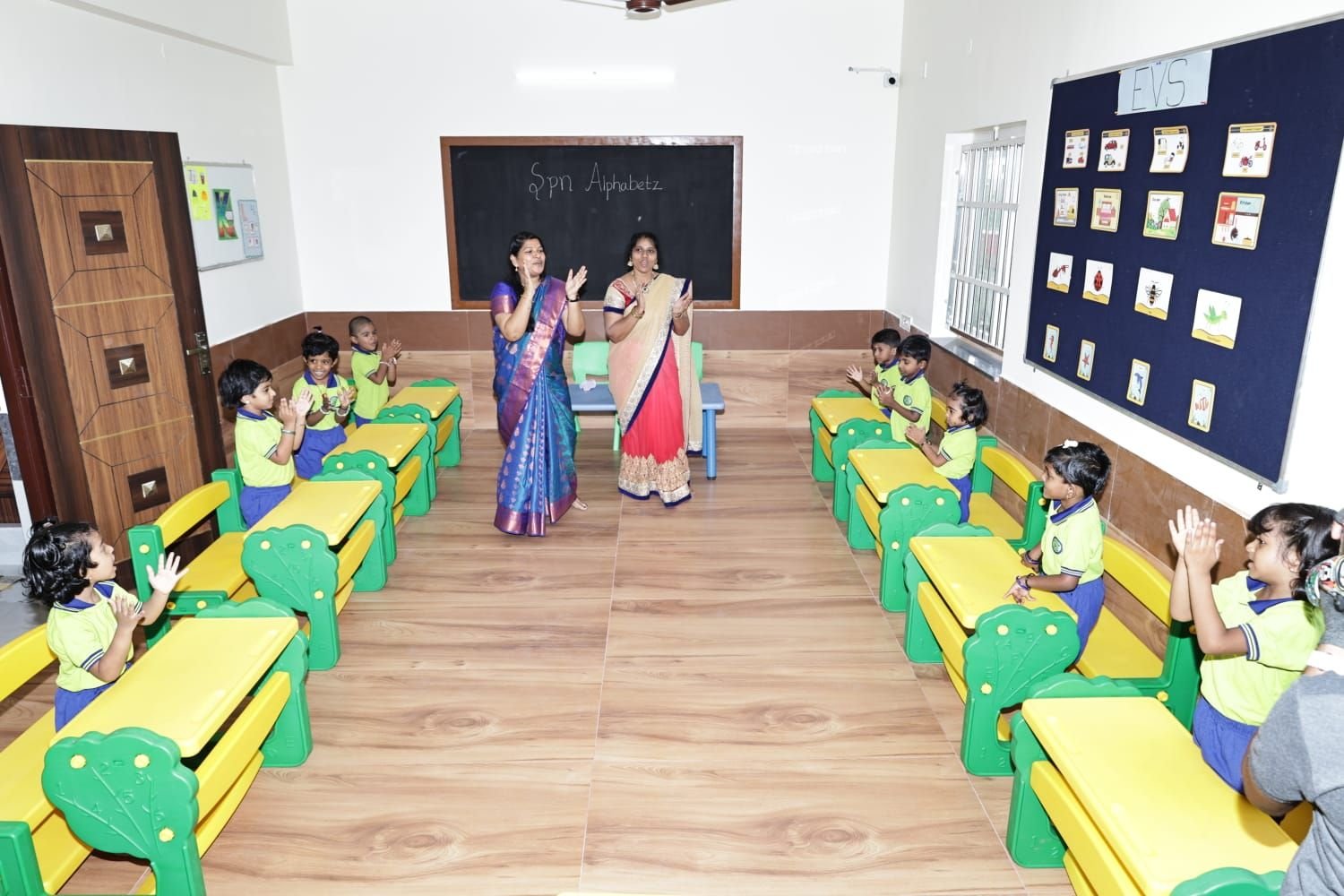 Teachers leading a fun movement and dance session with students